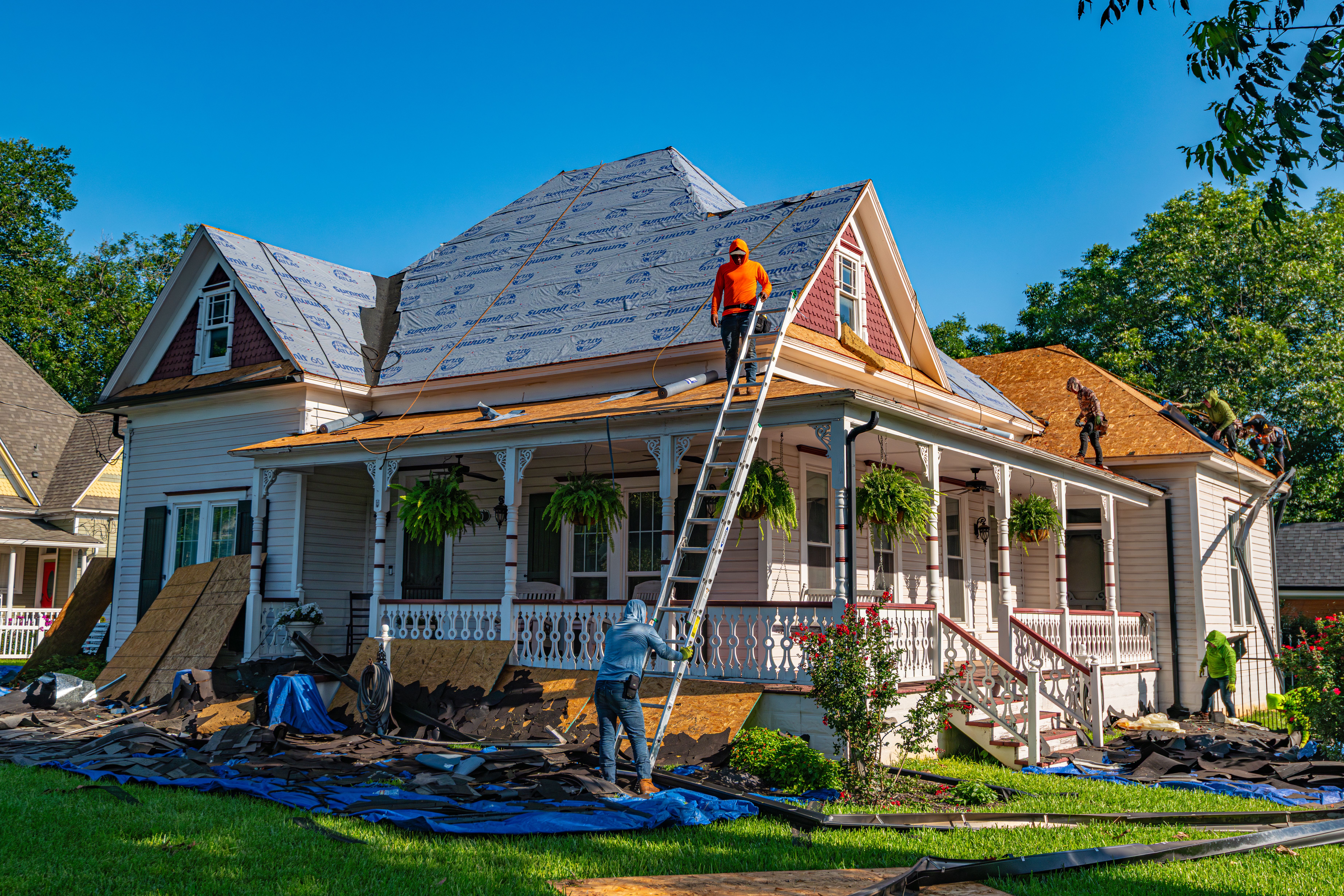 Professional roof installation on a residential home